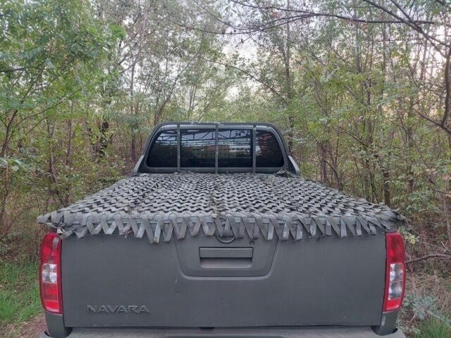 Зеленый Ниссан Навара, объемом двигателя 2.5 л и пробегом 269 тыс. км за 5000 $, фото 6 на Automoto.ua