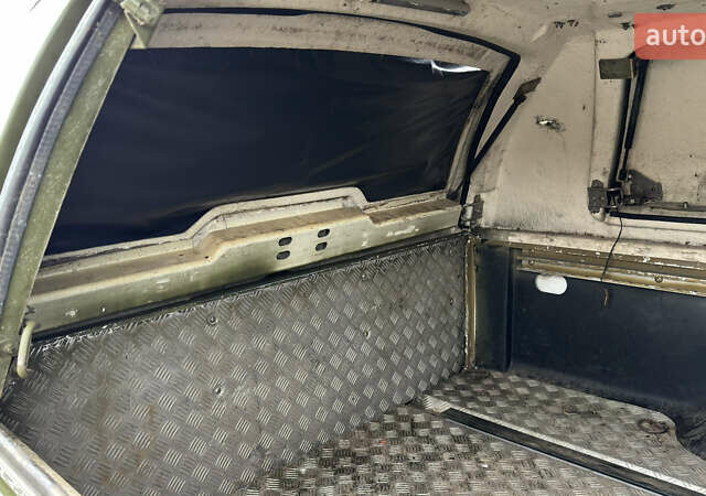 Зеленый Ниссан Навара, объемом двигателя 2.5 л и пробегом 300 тыс. км за 5800 $, фото 45 на Automoto.ua