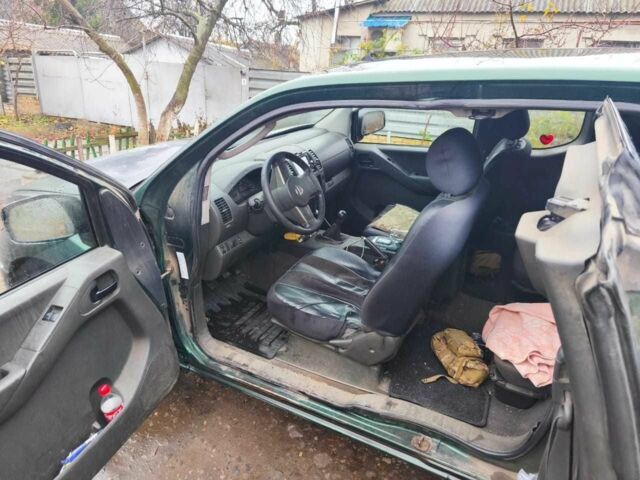 Зелений Ніссан Навара, об'ємом двигуна 2.5 л та пробігом 312 тис. км за 5674 $, фото 5 на Automoto.ua