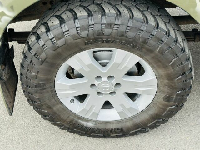 Зеленый Ниссан Навара, объемом двигателя 2.5 л и пробегом 250 тыс. км за 7254 $, фото 16 на Automoto.ua