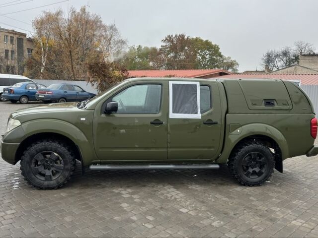 Зеленый Ниссан Навара, объемом двигателя 2.5 л и пробегом 300 тыс. км за 5800 $, фото 1 на Automoto.ua