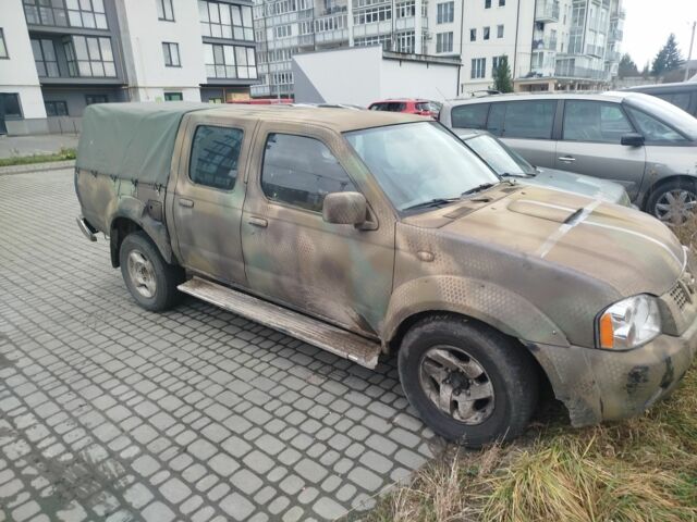 Зеленый Ниссан Навара, объемом двигателя 2.5 л и пробегом 360 тыс. км за 4500 $, фото 2 на Automoto.ua