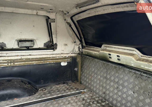 Зеленый Ниссан Навара, объемом двигателя 2.5 л и пробегом 300 тыс. км за 5800 $, фото 48 на Automoto.ua