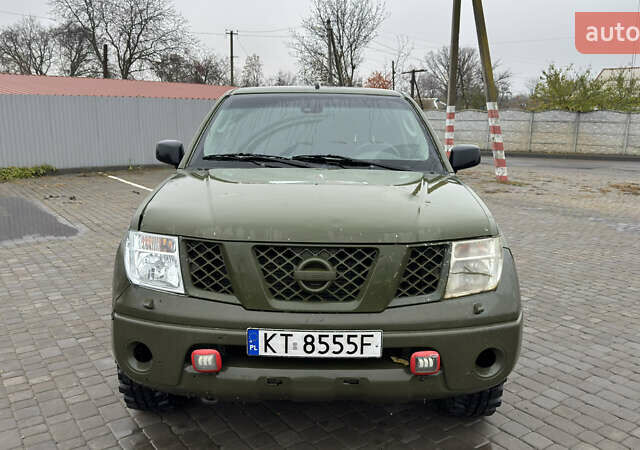 Зеленый Ниссан Навара, объемом двигателя 2.5 л и пробегом 300 тыс. км за 5800 $, фото 13 на Automoto.ua