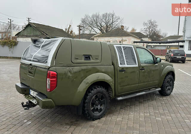 Зеленый Ниссан Навара, объемом двигателя 2.5 л и пробегом 300 тыс. км за 5800 $, фото 8 на Automoto.ua