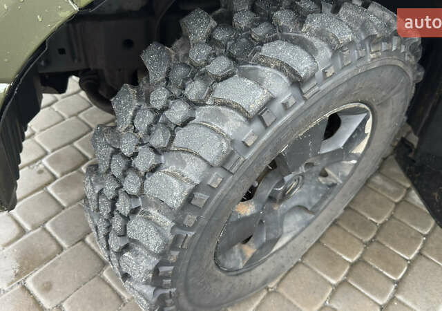 Зеленый Ниссан Навара, объемом двигателя 2.5 л и пробегом 300 тыс. км за 5800 $, фото 52 на Automoto.ua