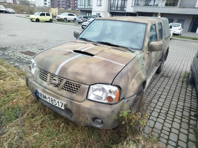 Зеленый Ниссан Навара, объемом двигателя 2.5 л и пробегом 360 тыс. км за 4500 $, фото 1 на Automoto.ua