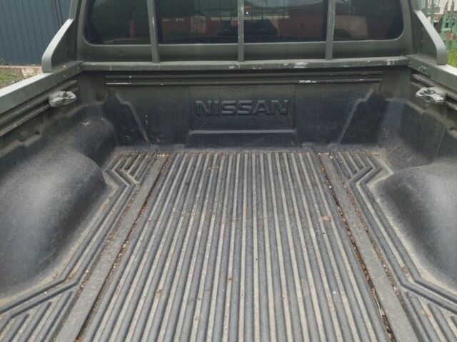 Зеленый Ниссан Навара, объемом двигателя 2.5 л и пробегом 269 тыс. км за 5000 $, фото 3 на Automoto.ua