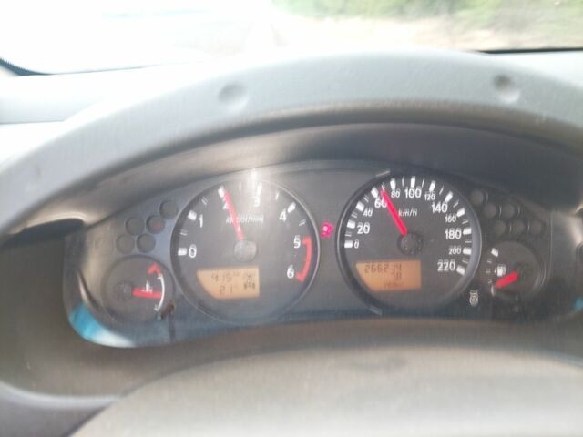 Зеленый Ниссан Навара, объемом двигателя 2.5 л и пробегом 269 тыс. км за 5000 $, фото 2 на Automoto.ua