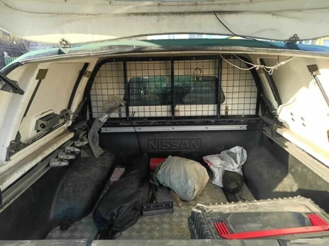 Зеленый Ниссан Навара, объемом двигателя 2.5 л и пробегом 167 тыс. км за 5906 $, фото 3 на Automoto.ua