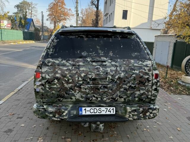 Зелений Ніссан Навара, об'ємом двигуна 2.5 л та пробігом 286 тис. км за 7000 $, фото 5 на Automoto.ua