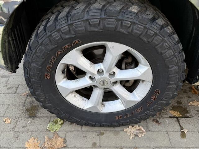 Зелений Ніссан Навара, об'ємом двигуна 2.5 л та пробігом 286 тис. км за 7000 $, фото 13 на Automoto.ua