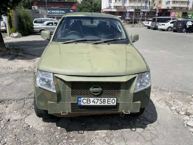 Зеленый Ниссан Навара, объемом двигателя 2.5 л и пробегом 147 тыс. км за 6500 $, фото 2 на Automoto.ua