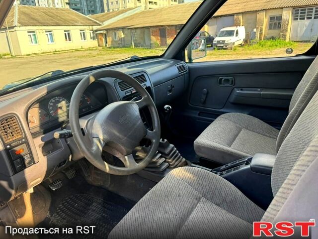 Зелений Ніссан Навара, об'ємом двигуна 2.5 л та пробігом 267 тис. км за 3800 $, фото 4 на Automoto.ua