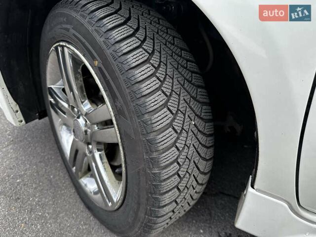 Білий Ніссан Ноут, об'ємом двигуна 1.6 л та пробігом 104 тис. км за 7600 $, фото 23 на Automoto.ua