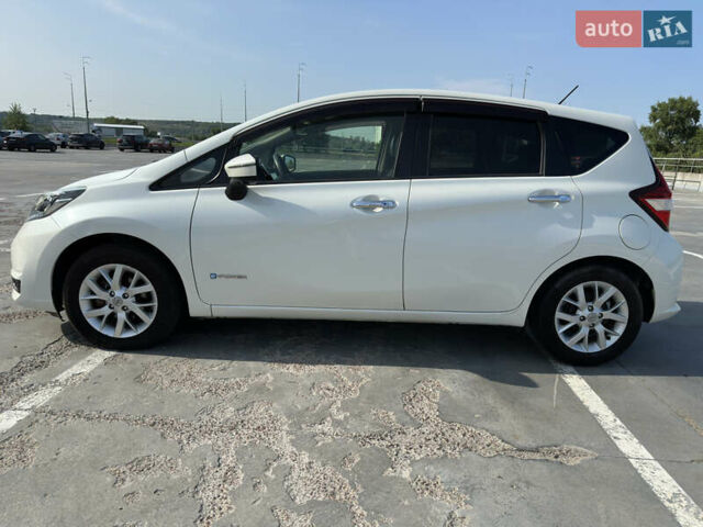 Білий Ніссан Ноут, об'ємом двигуна 1.2 л та пробігом 55 тис. км за 12800 $, фото 7 на Automoto.ua