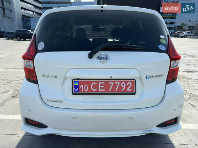 Білий Ніссан Ноут, об'ємом двигуна 1.2 л та пробігом 55 тис. км за 12800 $, фото 6 на Automoto.ua