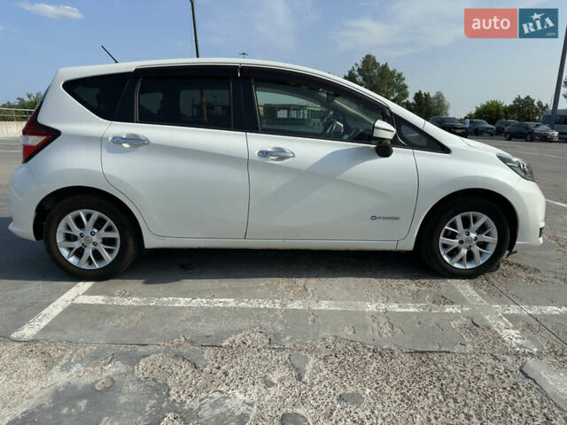 Білий Ніссан Ноут, об'ємом двигуна 1.2 л та пробігом 55 тис. км за 12800 $, фото 4 на Automoto.ua