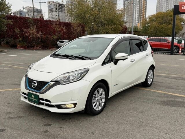 Белый Ниссан Ноут, объемом двигателя 1.2 л и пробегом 38 тыс. км за 13300 $, фото 3 на Automoto.ua