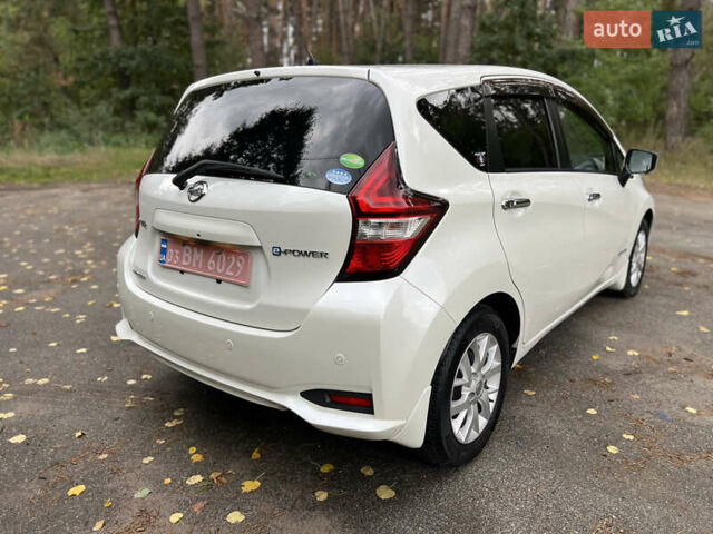 Білий Ніссан Ноут, об'ємом двигуна 1.2 л та пробігом 88 тис. км за 12200 $, фото 7 на Automoto.ua