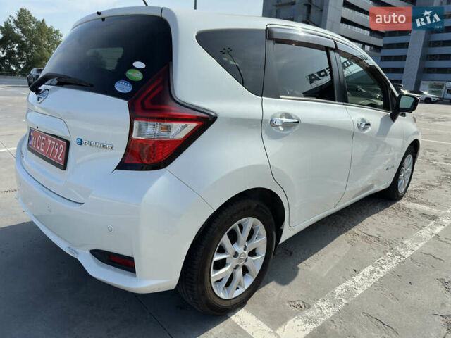 Білий Ніссан Ноут, об'ємом двигуна 1.2 л та пробігом 55 тис. км за 12800 $, фото 5 на Automoto.ua