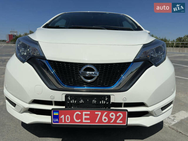 Білий Ніссан Ноут, об'ємом двигуна 1.2 л та пробігом 86 тис. км за 11200 $, фото 5 на Automoto.ua