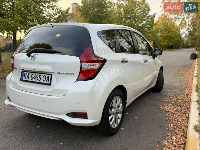 Білий Ніссан Ноут, об'ємом двигуна 1.2 л та пробігом 100 тис. км за 11650 $, фото 8 на Automoto.ua
