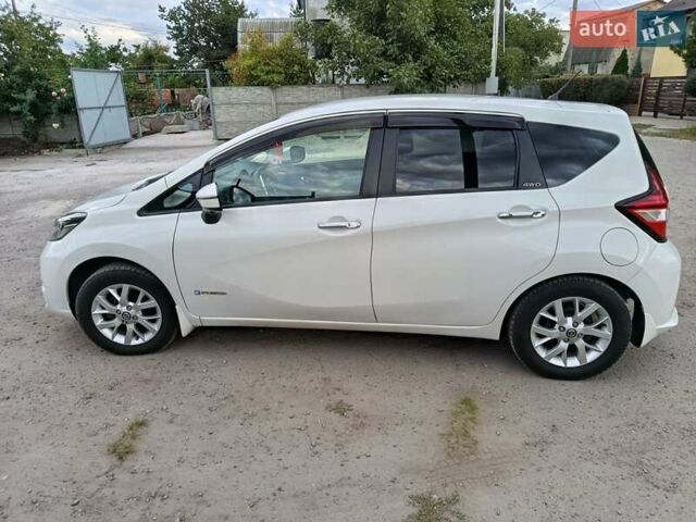 Білий Ніссан Ноут, об'ємом двигуна 1.2 л та пробігом 53 тис. км за 13150 $, фото 22 на Automoto.ua