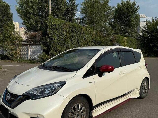 Білий Ніссан Ноут, об'ємом двигуна 1.2 л та пробігом 95 тис. км за 13300 $, фото 7 на Automoto.ua