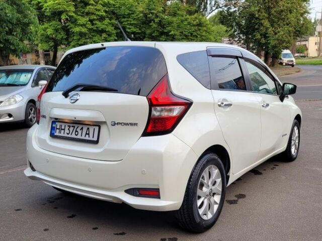 Білий Ніссан Ноут, об'ємом двигуна 1.2 л та пробігом 85 тис. км за 12650 $, фото 4 на Automoto.ua