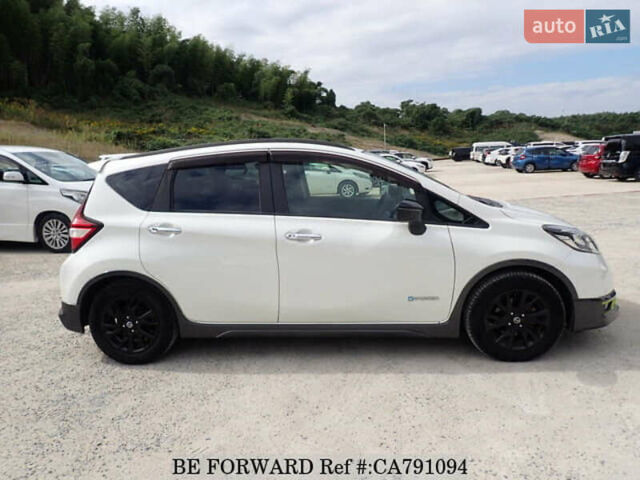 Білий Ніссан Ноут, об'ємом двигуна 1.2 л та пробігом 58 тис. км за 13100 $, фото 5 на Automoto.ua