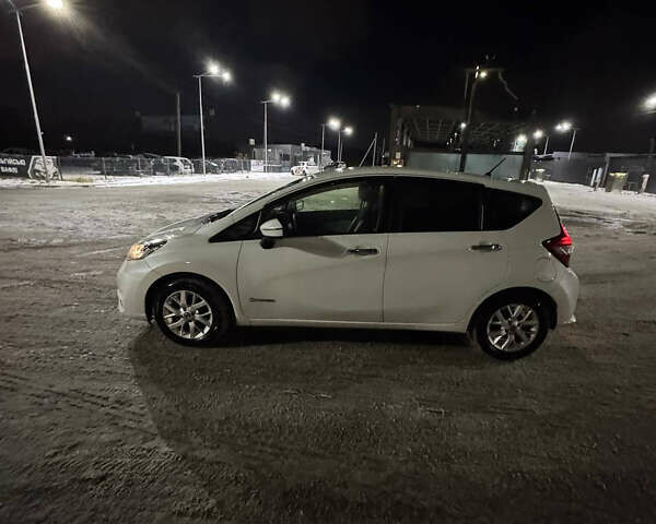 Білий Ніссан Ноут, об'ємом двигуна 1.2 л та пробігом 45 тис. км за 13800 $, фото 9 на Automoto.ua