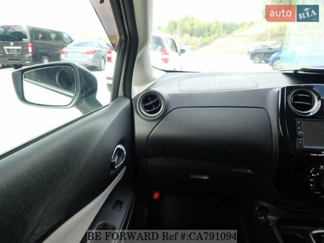 Білий Ніссан Ноут, об'ємом двигуна 1.2 л та пробігом 58 тис. км за 13100 $, фото 30 на Automoto.ua