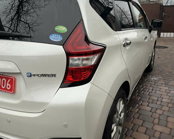 Білий Ніссан Ноут, об'ємом двигуна 1.2 л та пробігом 47 тис. км за 11999 $, фото 50 на Automoto.ua