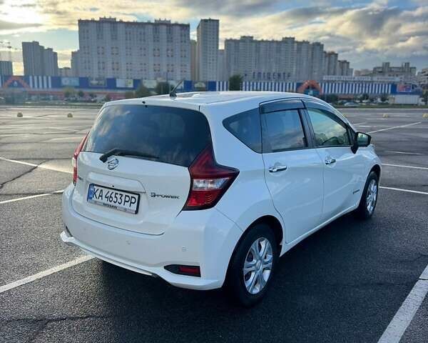 Білий Ніссан Ноут, об'ємом двигуна 1.2 л та пробігом 54 тис. км за 12999 $, фото 19 на Automoto.ua