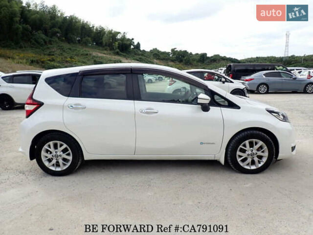 Білий Ніссан Ноут, об'ємом двигуна 1.2 л та пробігом 85 тис. км за 12700 $, фото 5 на Automoto.ua