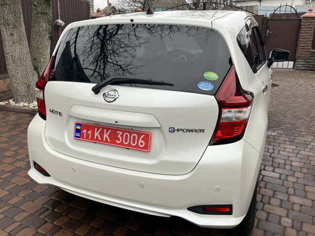 Білий Ніссан Ноут, об'ємом двигуна 1.2 л та пробігом 47 тис. км за 11999 $, фото 48 на Automoto.ua