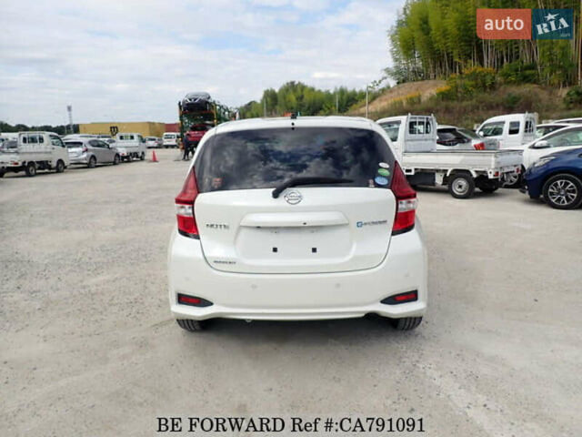 Білий Ніссан Ноут, об'ємом двигуна 1.2 л та пробігом 85 тис. км за 12700 $, фото 3 на Automoto.ua