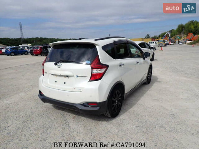 Білий Ніссан Ноут, об'ємом двигуна 1.2 л та пробігом 58 тис. км за 13100 $, фото 4 на Automoto.ua