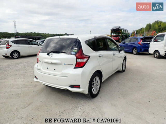 Білий Ніссан Ноут, об'ємом двигуна 1.2 л та пробігом 85 тис. км за 12700 $, фото 4 на Automoto.ua