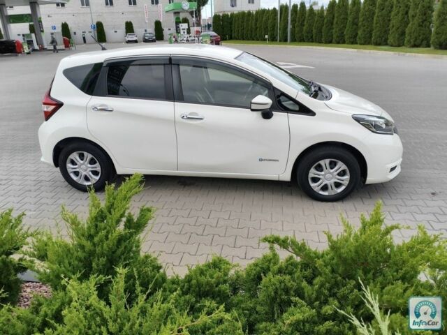 Білий Ніссан Ноут, об'ємом двигуна 1.2 л та пробігом 61 тис. км за 12400 $, фото 1 на Automoto.ua