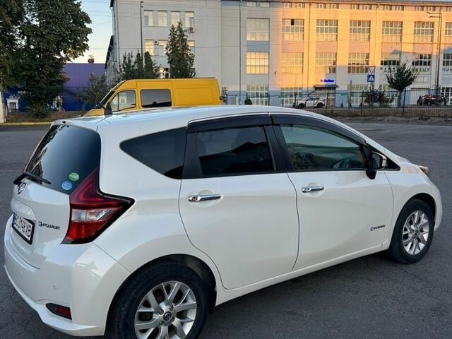 Білий Ніссан Ноут, об'ємом двигуна 1.2 л та пробігом 57 тис. км за 11800 $, фото 22 на Automoto.ua
