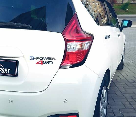 Білий Ніссан Ноут, об'ємом двигуна 1.2 л та пробігом 36 тис. км за 13200 $, фото 2 на Automoto.ua