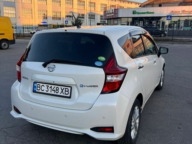 Білий Ніссан Ноут, об'ємом двигуна 1.2 л та пробігом 57 тис. км за 11800 $, фото 18 на Automoto.ua