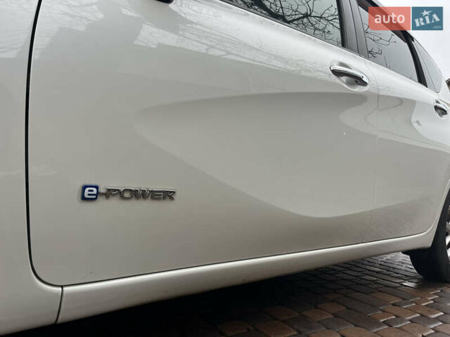 Білий Ніссан Ноут, об'ємом двигуна 1.2 л та пробігом 47 тис. км за 11999 $, фото 25 на Automoto.ua