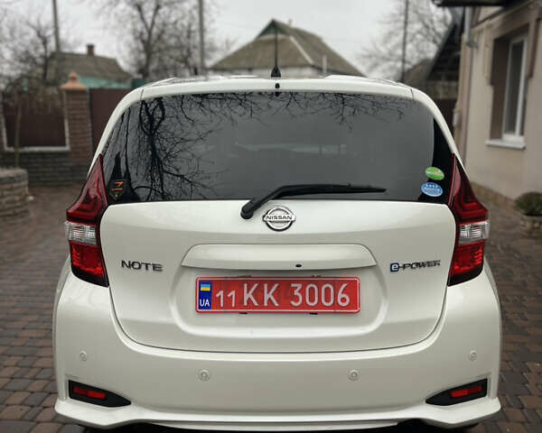 Білий Ніссан Ноут, об'ємом двигуна 1.2 л та пробігом 47 тис. км за 11999 $, фото 39 на Automoto.ua