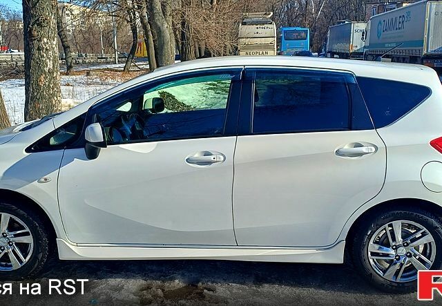 Білий Ніссан Ноут, об'ємом двигуна 1.2 л та пробігом 121 тис. км за 8900 $, фото 2 на Automoto.ua