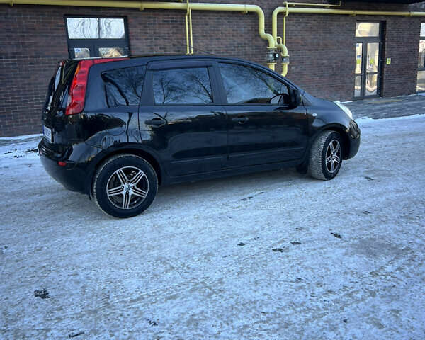 Черный Ниссан Ноут, объемом двигателя 1.6 л и пробегом 179 тыс. км за 6999 $, фото 3 на Automoto.ua