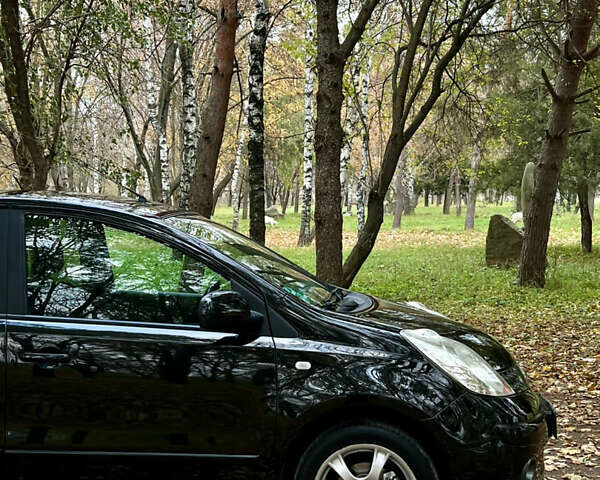 Черный Ниссан Ноут, объемом двигателя 1.6 л и пробегом 172 тыс. км за 5800 $, фото 5 на Automoto.ua