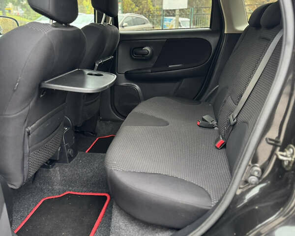 Чорний Ніссан Ноут, об'ємом двигуна 1.4 л та пробігом 217 тис. км за 5000 $, фото 24 на Automoto.ua